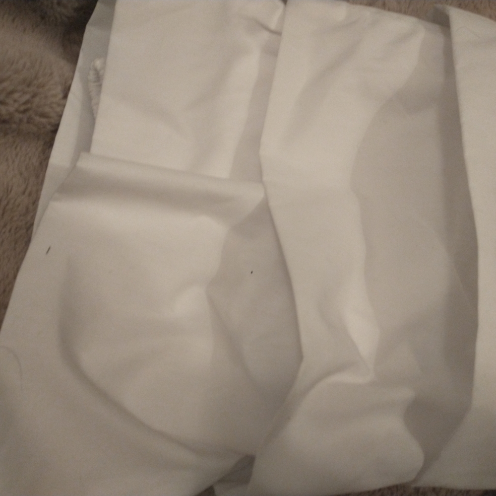 White ruffle sleeve shirt. Elbow length